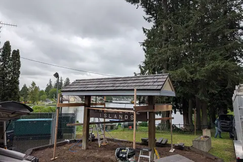 A Brava composite shake tile roof on a lakefront structure in Lake Tapps