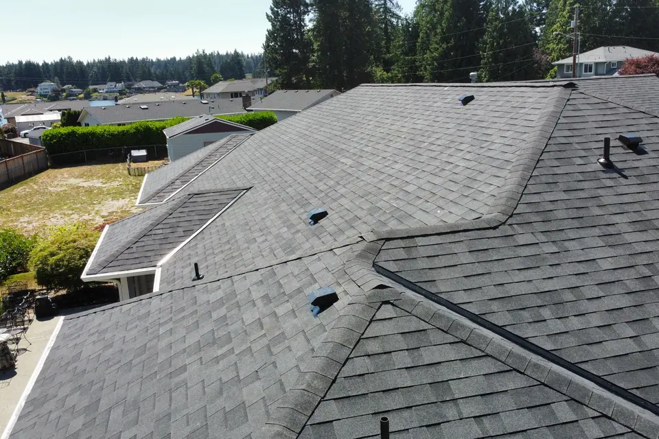 A completed Malarkey Vista hip roof at Driftwood Point